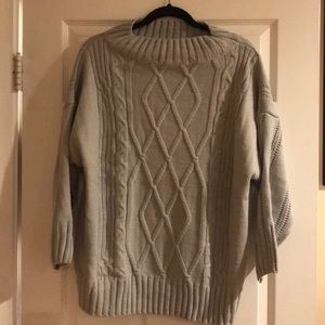 Grey off shoulder cable knit sweater